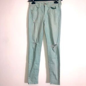 Light Wash Teal AMERICAN EAGLE Ripped Skinny Jeans